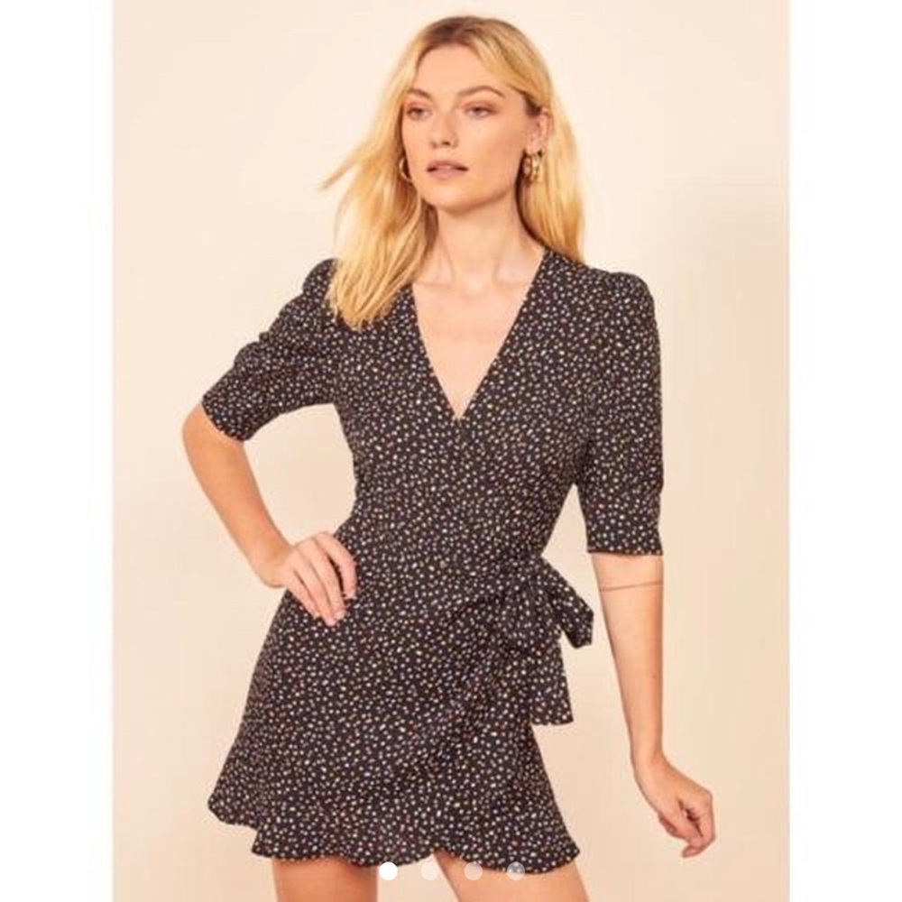 Lovely reformation Deanna dress. Black w colored polka dots. So sweet. Like new